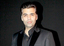 Karan Johar lashes out at twitter user over snide comment