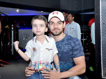 Sooraj Pancholi snapped with a kid fan at Gym launch