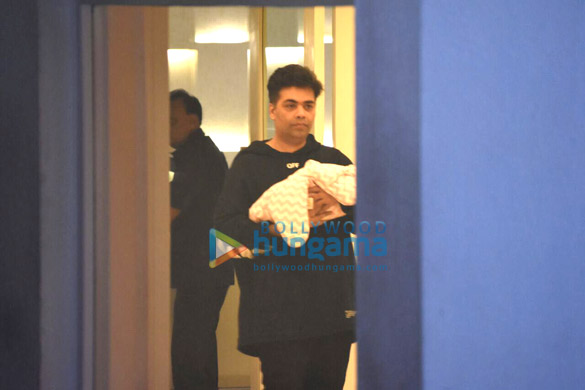 Karan Johar snapped taking his twins Yash & Roohi home Karan Johar snapped taking his twins Yash & Roohi home