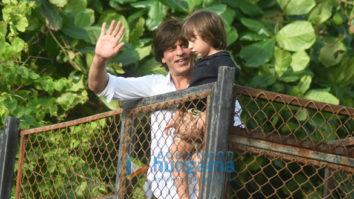 Shah Rukh Khan and Abram snapped waving and wishing fans Eid Mubarak at Mannat