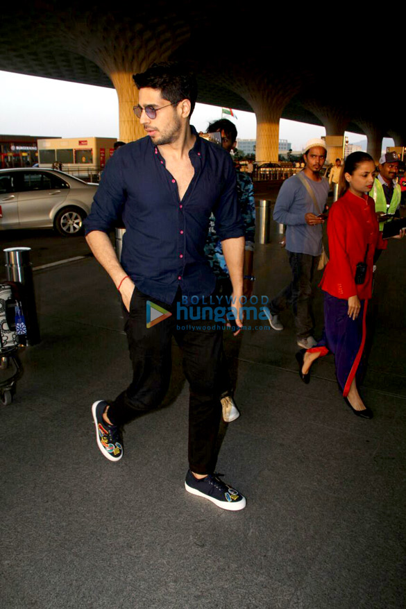 Sidharth Malhotra and Adah Sharma snapped at the airport Sidharth Malhotra and Adah Sharma snapped at the airport