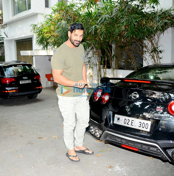 John Abraham spotted with his sports car and bike