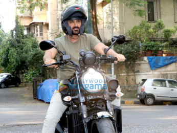 John Abraham spotted with his sports car and bike