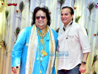 Bappi Lahiri and Chitrani Lahiri attend the rice ceremony of their grandson Krishh Lahiri