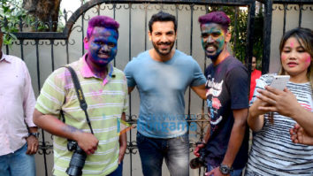 John Abraham celebrates Holi with photographers in Bandra