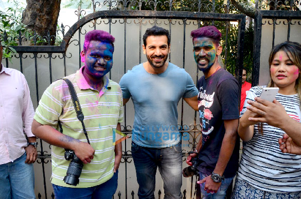 John Abraham celebrates Holi with photographers in Bandra John Abraham celebrates Holi with photographers in Bandra