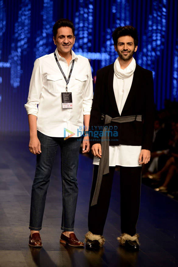 Kartik Aaryan walks the ramp for Pawan Sachdeva at the Amazon Fashion Week Kartik Aaryan walks the ramp for Pawan Sachdeva at the Amazon Fashion Week
