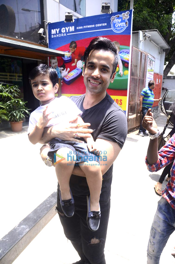 Tusshar Kapoor snapped with his son Laksshya outside the gym in Bandra Tusshar Kapoor snapped with his son Laksshya outside the gym in Bandra
