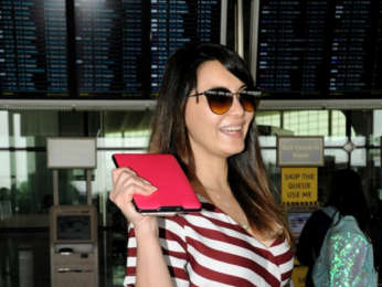 Ajay Devgn and Minissha Lamba snapped at the airport