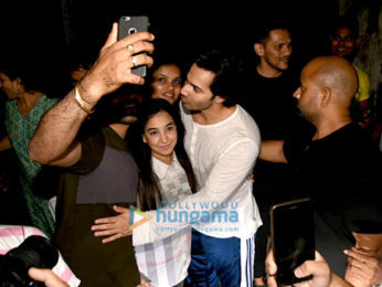 Varun Dhawan snapped giving selfies to his fans
