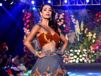 Malaika Arora walks the ramp at the Wedding Junction fashion show