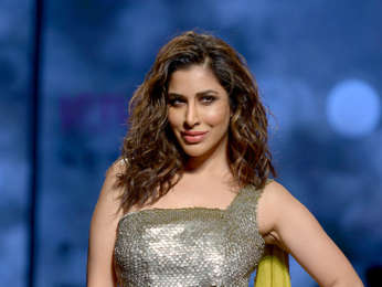 Sophie Choudry walks the ramp in an abstract design by Megha Jain Madaan