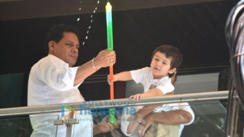 Taimur Ali Khan spotted playing Holi in his balcony