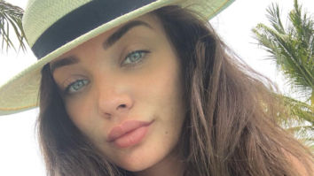 Amy Jackson flaunts her baby bump while enjoying miniature golf