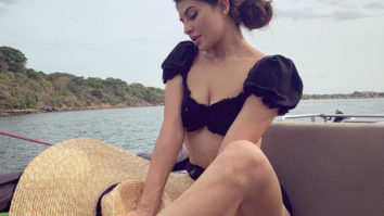 HOT! Jacqueline Fernandez will drive your Monday blues away as she poses in a black bikini on a yacht!