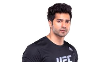 Watch: Varun Dhawan delights fans at the airport by gifting them roses