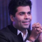 After taking a dig at Karan Johar's fashion choice and films, Yash Johar makes a comment on his father's singing