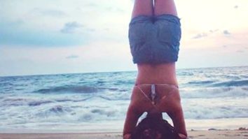 Amala Paul shares pictures of her headstand pose by the beach; calls it a new start