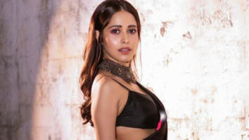 Nushrratt Bharuccha is giving us major festive vibes in her fuchsia-black Shibori saree