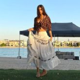 Shah Rukh Khan’s daughter Suhana Khan poses by the lake in a chic boho skirt with a knotted top