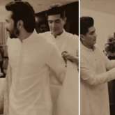 Manish Malhotra captures the moments of dressing groom Varun Dhawan up for his wedding with Natasha Dalal