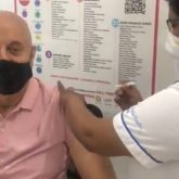 Anupam Kher takes the first dose of COVID-19 vaccination; shares video
