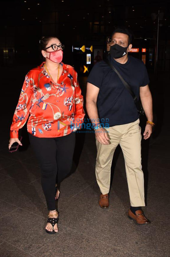 Photos: Govinda and wife Sunita Ahuja snapped at the airport Photos: Govinda and wife Sunita Ahuja snapped at the airport