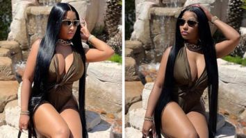 Nicki Minaj pairs her sexy plunging neckline seaweed green bodysuit with Fendi handbag