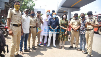 Photos: Mika Singh, Vindu Dara Singh and Bhoomi Trivedi snapped distributing food to needy people at Goregaon