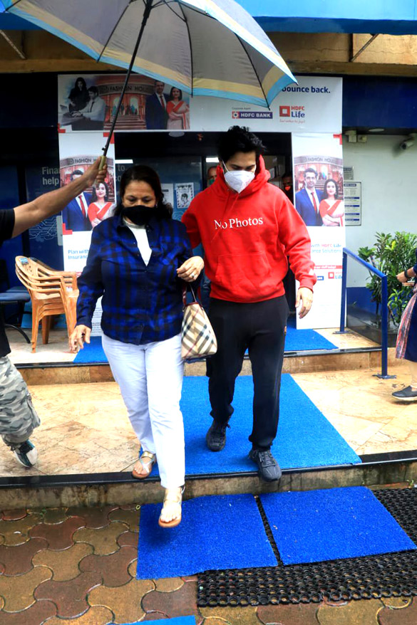 Photos: Varun Dhawan snapped with his mother at a bank in Santacruz Photos: Varun Dhawan snapped with his mother at a bank in Santacruz