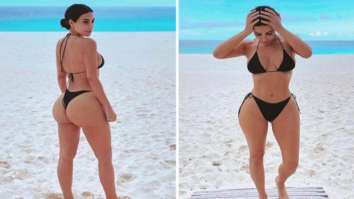 Kim Kardashian flaunts her resting beach face in black monokini bikini set