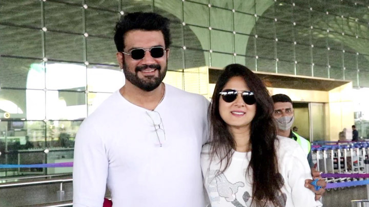 Spotted: Sharad Kelkar with his wife at Mumbai Airport