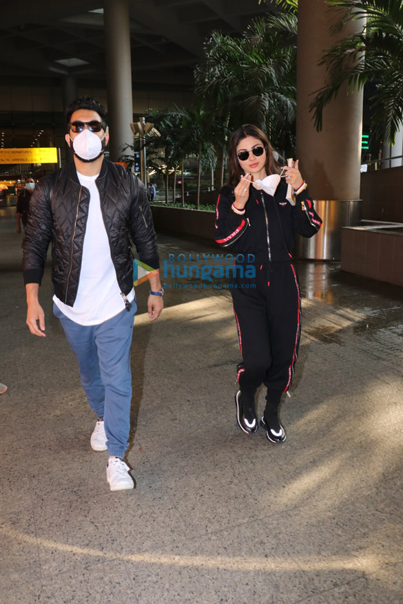 Photos: Mouni Roy and her husband spotted at the airport Photos: Mouni Roy and her husband spotted at the airport