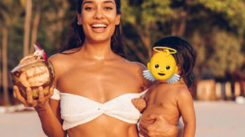 Lisa Haydon poses in a white bikini as she shares glimpses from her day out at the beach with her daughter