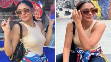 Mrunal Thakur rocks edgy street style look in beige camisole and denim pants as she strolls around Delhi Haat