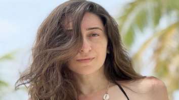Karisma Kapoor drops a sizzling photo in purple sequined swimsuit from beach vacation