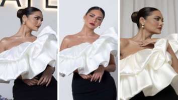 Esha Gupta is a vision to behold in black-and-white ruffled dress as she attends an event in Doha