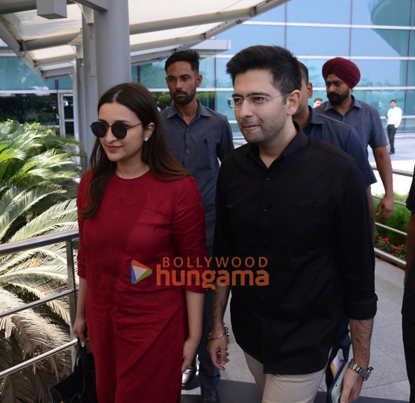 Photos: Parineeti Chopra and Raghav Chadha snapped at New Delhi airport Photos: Parineeti Chopra and Raghav Chadha snapped at New Delhi airport