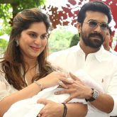 Ram Charan and Upasana Kamineni Konidela pose for the paps with their newborn daughter