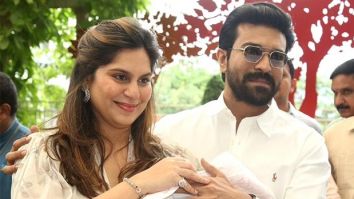 Ram Charan and Upasana Kamineni Konidela pose for the paps with their newborn daughter