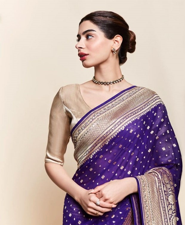 Khushi Kapoor's purple saree by Anita Dongre perfectly embodies the essence of the festive season