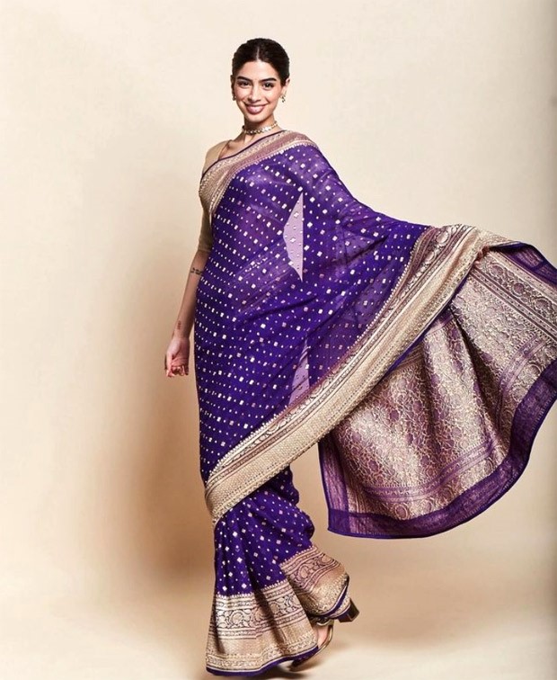 Khushi Kapoor's purple saree by Anita Dongre perfectly embodies the essence of the festive season