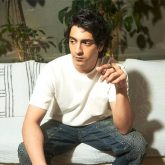Ahaan Panday keeps it crisp in classic blue Louis Vuitton monogrammed denims and white t-shirt