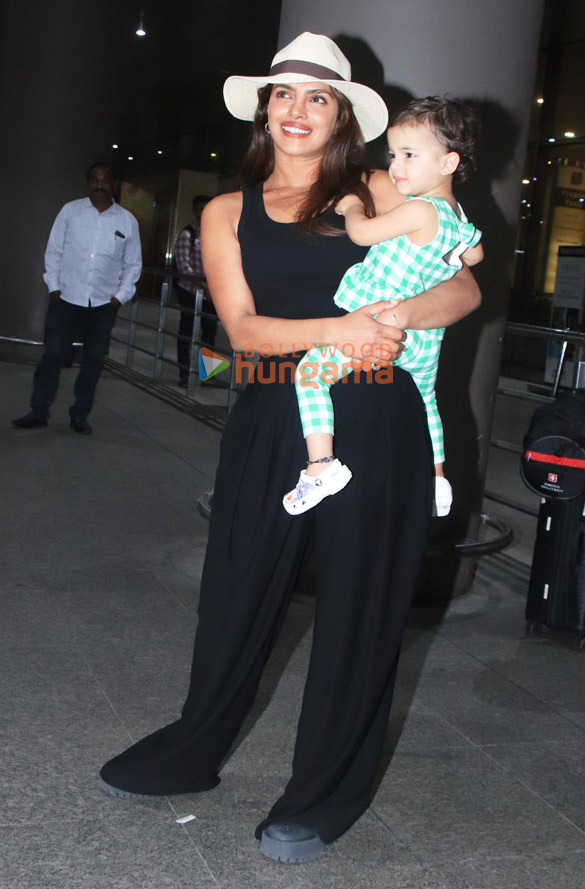 Photos: Priyanka Chopra Jonas snapped with her daughter at the airport Photos: Priyanka Chopra Jonas snapped with her daughter at the airport