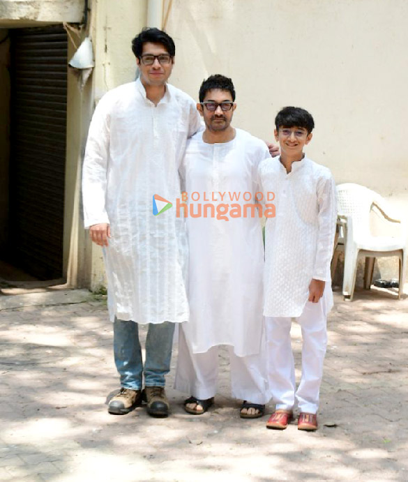 Photos: Aamir Khan with sons Junaid and Azad snapped outside their residence Marina on the occasion of Eid. Photos: Aamir Khan with sons Junaid and Azad snapped outside their residence Marina on the occasion of Eid.