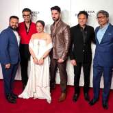 Karan Johar, Lakshya, Guneet Monga and team Kill strike a pose during the premiere at Tribeca Film Festival 2024