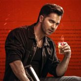 Baby John Taser Cut Varun Dhawan sips on cutting chai and holds a rifle in fierce massy avatar The legend begins now